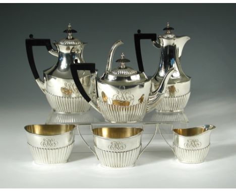 An American six piece metalwares tea and coffee set, by Black, Starr & Frost, New York, comprising:- an oval teapot, the lowe