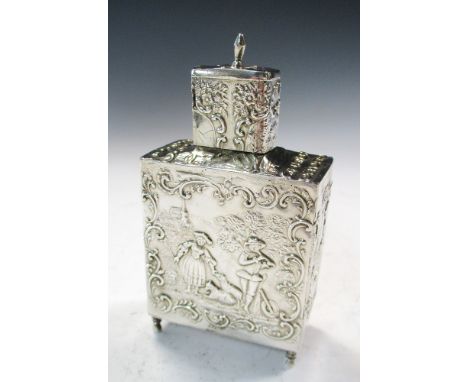 A small late 19th century Dutch silver caddy flask, rectangular with panels repousse decorated with flute player and shepherd