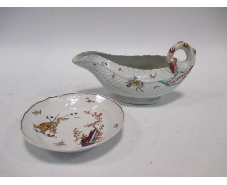 An 18th century Worcester leaf moulded sauce boat, painted with floral sprigs, 23cm (9in) long; a Meissen 'Fliegunde Hund' pa