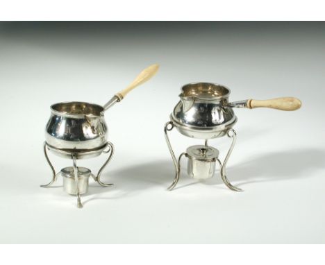 A matched pair of Victorian silver miniature brandy saucepans on stands, one by Arthur Sibley, London 1876, the pan with bone