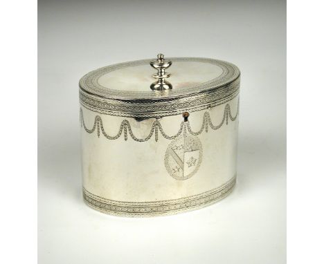 A George III silver tea caddy, by Robert Hennell, London 1779, of oval shape with bright cut engraved borders and with engrav