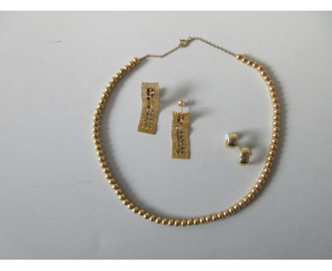 A collection of 18ct gold jewellery, the first a pair of hinged broad but small diameter hoop earstuds, London hallmarks 2004