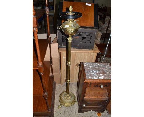 Brass oil lamp on stand
