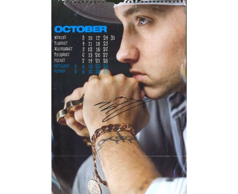Large page taken from a calendar, measuring 40cm x 30cm autographed by Marshall Mathers aka Eminem, the famous rapper. Could 