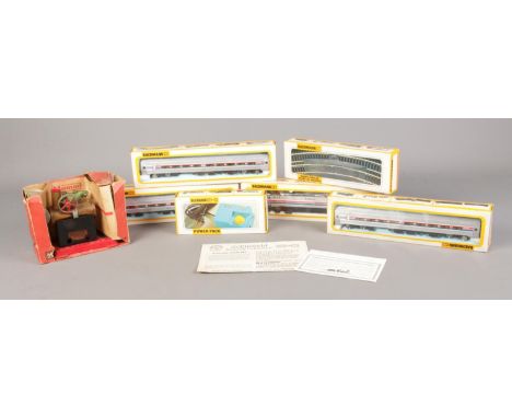A Boxed Mamod Minor 1 Steam Engine, together with A Bachmann HO Gauge Train Set. Includes 'Amtrak' Metroliner, three carriage