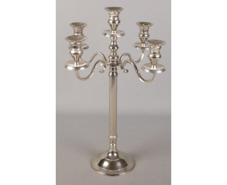 A large silver plate four branch candelabra.  