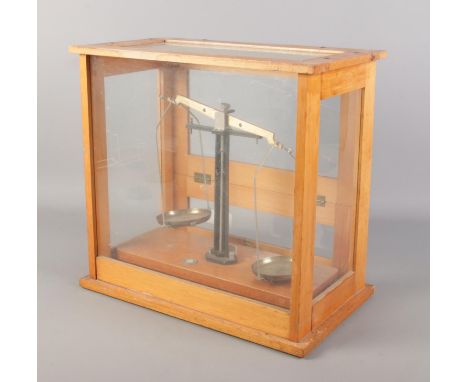 A cased set of Reynolds &amp; Branson Ltd chemical balance scales.  