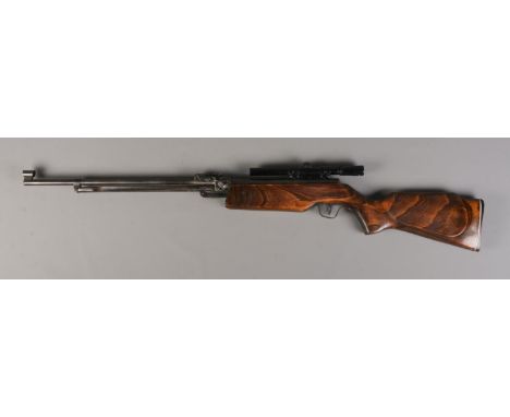 A Relum Tornado .177cal underlever air rifle, with Relum 4x15 scope. Cocks and fires. CANNOT POST.  