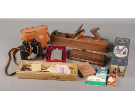 A box of miscellaneous. Includes Zenith binoculars, hip flask, wood working tools etc.  