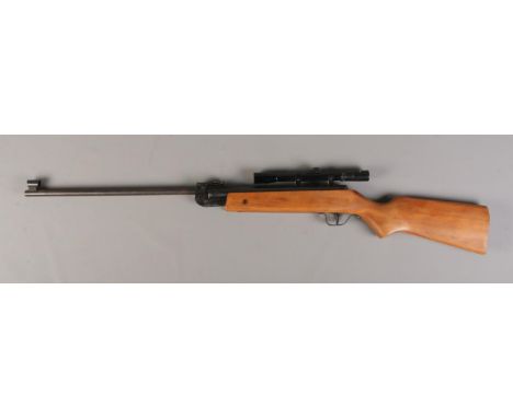A Relum LG527 .177cal break barrel air rifle, with Nikko Stirling 4x20 scope. Cocks and Fires. CANNOT POST.  Crack to scope.