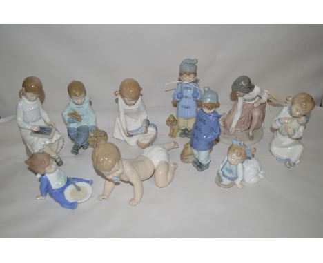 Nao figures of babies and children.