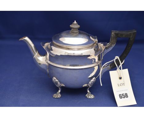 An Edward VII silver teapot, by Reid & Sons, London 1901, with hinged lid , wooden finial and handle, 14.4oz. gross.