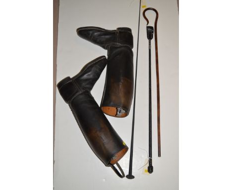 A pair of leather riding boots size 6, with trees; two riding crops; and a walking stick.