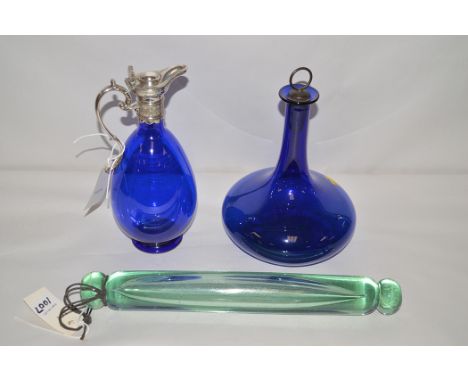 An early 20th Century claret jug, silver-plated mounts, blue glass body; a blue glass decanter; and a Victorian green glass r