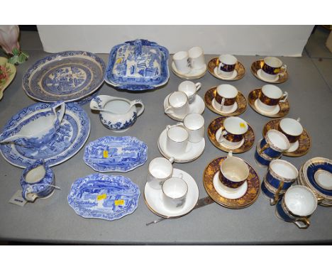 A set of six Crown Staffordshire coffee cups and saucers; Crown Staffordshire 'The Roller' by Thomas Bewick, a set of eight c