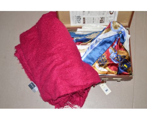 A small quantity of soft goods; an Hermes style silk scarf; in 'python' suitcase.