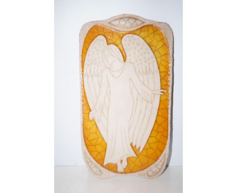 Sculptured tile of an angel signed by artist on verso 