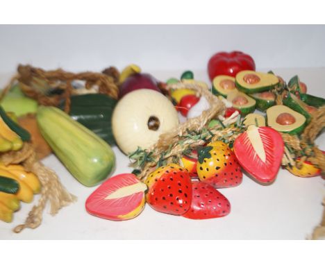 Collection of ceramic fruit on rope 