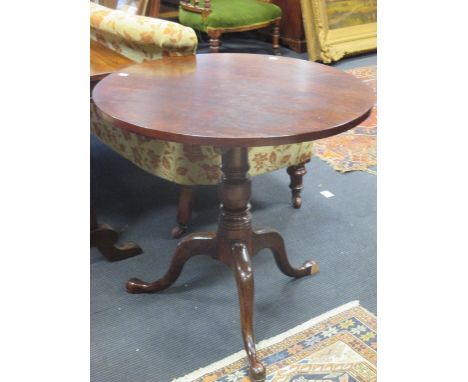 A Mahogany circular top tripod table, 76cm diameter  