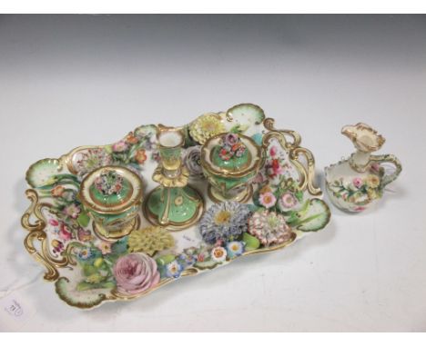 A Coalbrookdale desk set with two handled tray, inkpots and candlestick, together with a small encrusted jug (2)  
