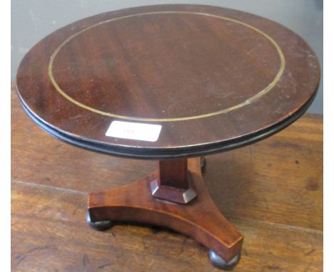 A mahogany apprentice circular topped tripod table 21 x 27.5cm  