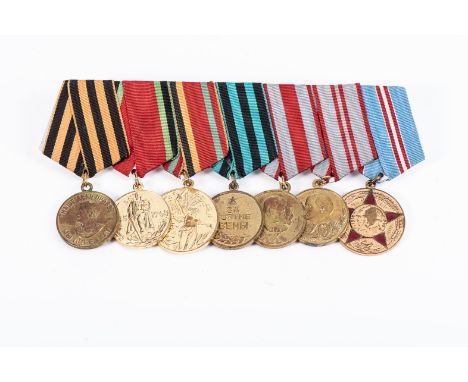 WWII RUSSIAN MEDAL GROUP MOUNTED FOR WEAR Soviet Victory over Germany, Capture of Kiev medal grouping of 7 medals: Victory Ov