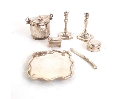 A COLLECTION OF SILVER MINIATURES Comprising: a pair of candlesticks, a tray, a box and cover, a pill box, a butter knife and