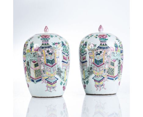 A PAIR OF CHINESE FAMILLE ROSE JARS AND COVERS, QING DYNASTY, 19TH CENTURY Each ovoid body painted with a tablescape of Schol