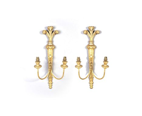 A PAIR OF GUILT BRONZE LIGHT FITTINGS With Rocco style scrolled branches with four light fittings with leaf motif with a tape