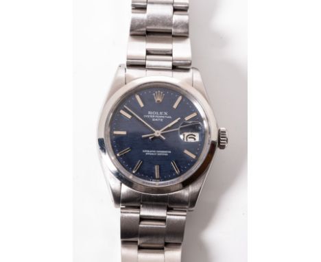 A GENTLEMAN'S STEEL ROLEX OYSTER PERPETUAL DATEJUST WRISTWATCH reference no 1500, the circular blue dial with baton markers, 