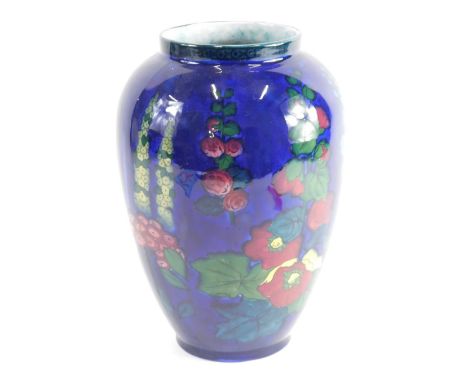 A 20thC pottery Adderley Limited Hollyhock pattern vase, typically decorated with flowers on an opalescent blue ground, print