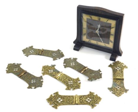 A Smiths Sectric oak cased mantel clock, with Roman numeric dial, and a quantity of elaborate part pierced brass hinges or bo