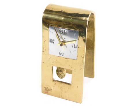 A 20thC gilt brass mantel clock, of arched form with square silvered dial with Roman numerals, with battery powered movement,