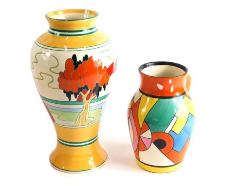 A Wedgwood Clarice Cliff pottery Bizarre lotus style jug, 22cm high, and a further vase, with paperwork. (2, boxed) 
