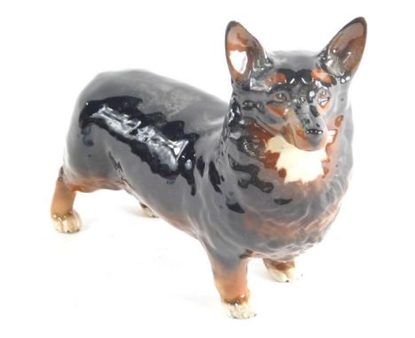 A Beswick pottery figure of a standing Corgi dog, Black Prince, marked beneath, 14cm high. 