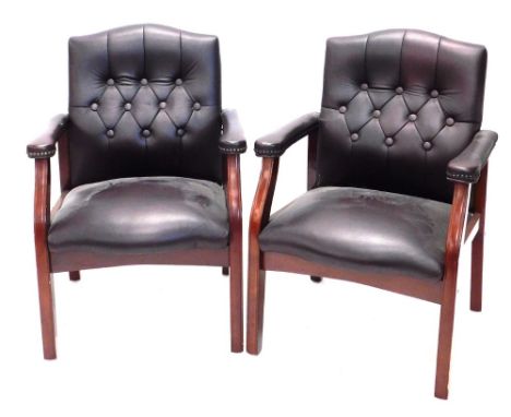 A pair of modern leather button back chairs, with serpentine seats, on square legs, 89cm high.  