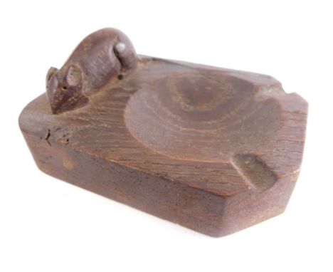 A Robert Thompson of Kilburn Mouseman oak ashtray, of rectangular form with rounded and canted corners, in dark patinated oak