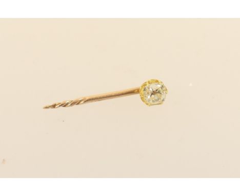 Diamond stick pin, old brilliant cut stone of approx. 0.25ct, in a yellow metal claw mount and stem (reduced), length 22mm