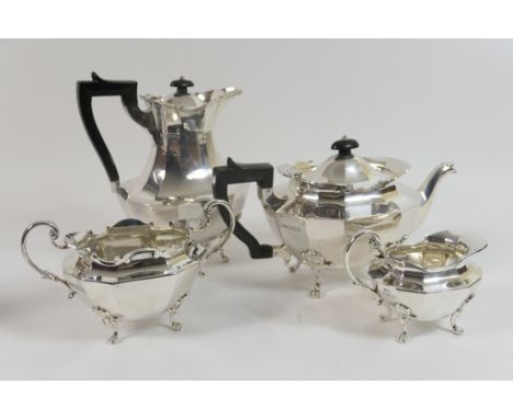 George V silver four piece tea service, maker MR, London 1917, comprising lidded teapot, hot water jug, sucrier and milk jug,