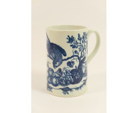 Worcester blue and white cylinder tankard, circa 1775, decorated with the parrot and fruit pattern, hatched crescent mark, 12