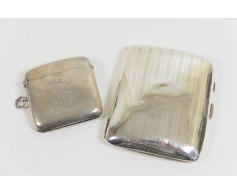 Edwardian silver vesta case, Birmingham 1908, curved rectangular form engraved with a monogram 'CR', 5.5cm; also a silver cur
