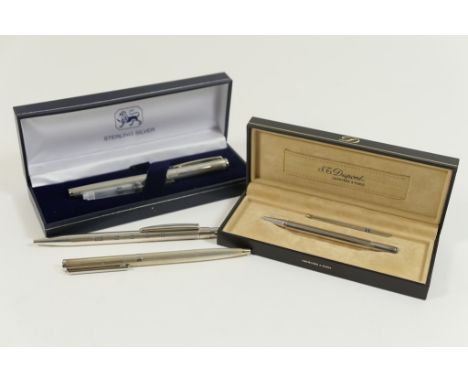 Dupont white metal propelling ballpoint pen with faceted barrel, 10.5cm, fitted case; also a sterling silver cartridge pen, e