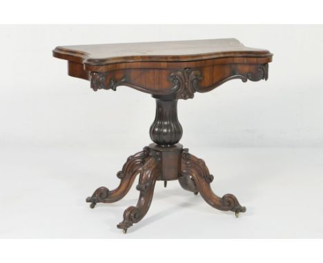 Victorian rosewood folding card table, serpentine shaped top with a moulded edge folding open to a green baize playing surfac