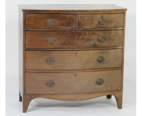 Late Regency mahogany bow front chest of drawers, circa 1820-30, the top crossbanded with rosewood and fitted with two short 