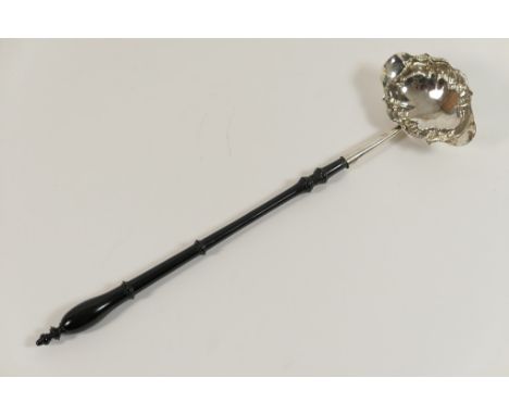 George III silver brandy ladle, maker T.S, London 1772, with turned ebony handle, 34.5cm