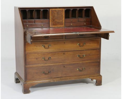 Late George III mahogany bureau, circa 1800-20, slope front enclosing a fitted interior with central crossbanded cupboard doo