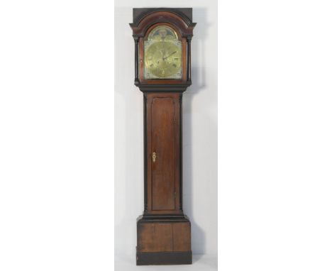 Smith of Tidswell, George III mahogany eight day longcase clock, the hood with an arched cavetto moulded cornice over turned 