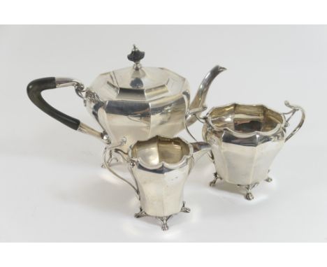 Edwardian silver three piece tea service by Roberts & Belk, Sheffield 1907/8, of octagonal inverted baluster form, the teapot