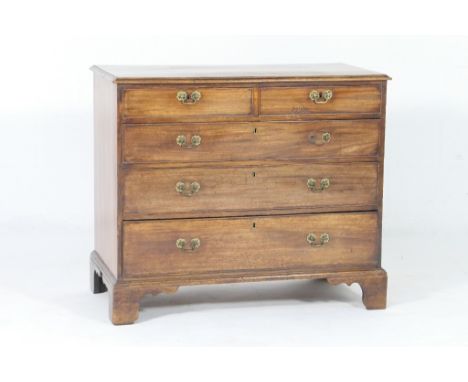 George III mahogany chest of drawers, circa 1800, fitted with two short and three long graduated drawers with later brass swa