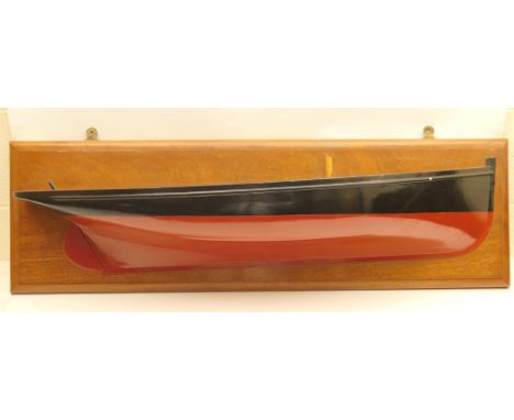 Boatbuilder's half hull model, mounted on a mahogany board, 111cm x 33cm